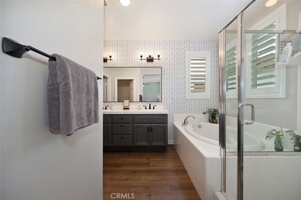 Bathroom, Dual Sink Vanities, Glass Shower, Interior, Recessed Lighting, Wood Texture Flooring