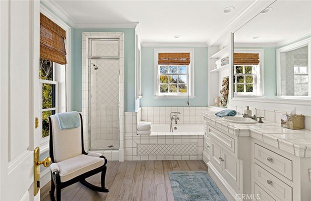 Bathroom, Glass Shower, Interior, Recessed Lighting, Tile Countertops, Wood Texture Flooring