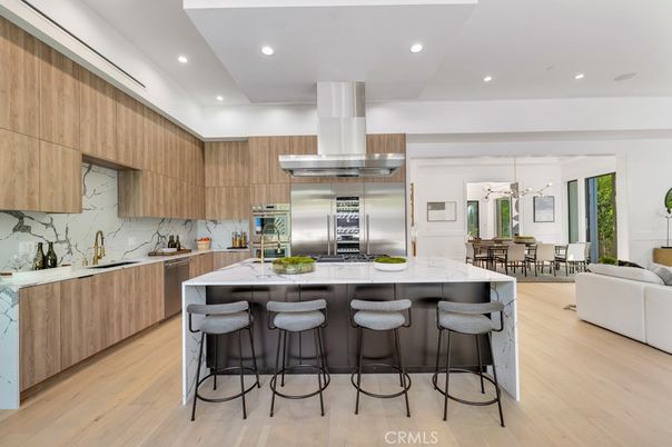 Dining room, Interior, Kitchen, Marble Walls, Recessed Lighting, Stainless Steel Appliances, Wood Texture Flooring