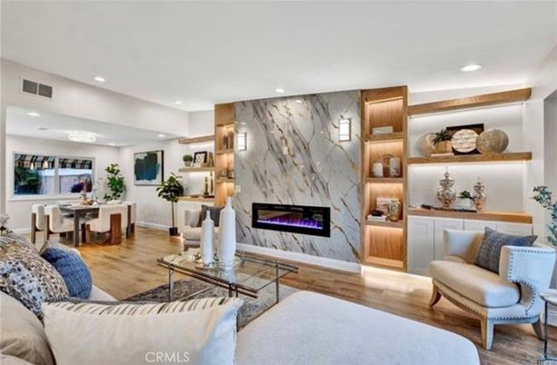 Dining room, Fireplace, Interior, Living room, Marble Walls, Recessed Lighting, Wood Texture Flooring