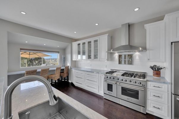 Dining room, Interior, Kitchen, Recessed Lighting, Stainless Steel Appliances, Wood Texture Flooring