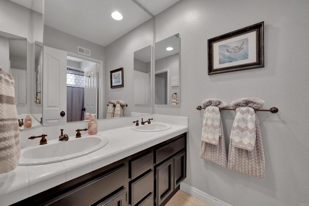 Bathroom, Dual Sink Vanities, Interior, Recessed Lighting, Tile Countertops
