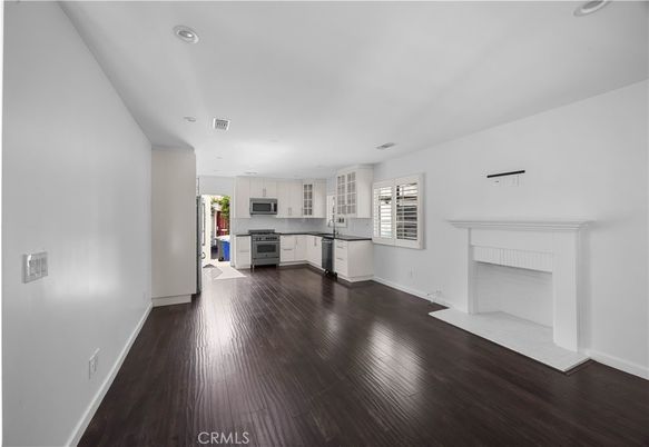 Fireplace, Interior, Kitchen, Recessed Lighting, Wood Texture Flooring