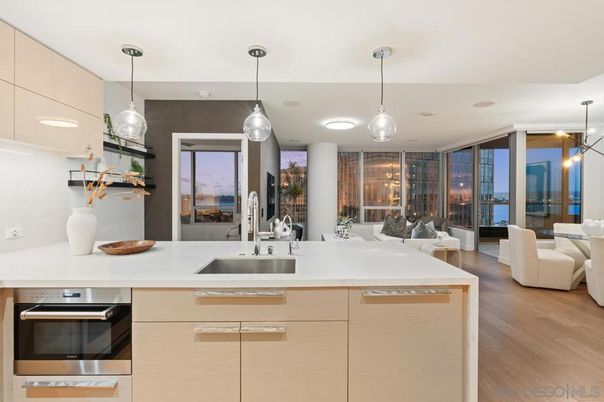 Dining room, Interior, Kitchen, Living room, Pendant Lights, Stainless Steel Appliances, Water, Wood Texture Flooring