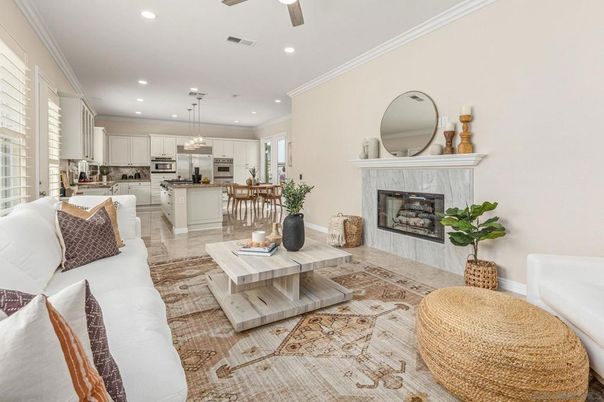 Chandelier, Dining room, Fireplace, Interior, Kitchen, Living room, Pendant Lights, Recessed Lighting, Stainless Steel Appliances