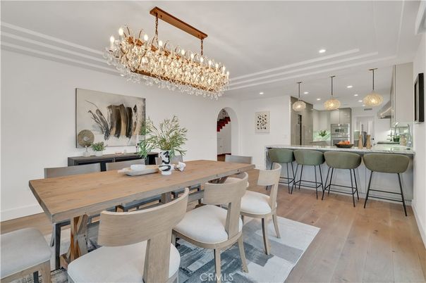 Chandelier, Dining room, Interior, Kitchen, Pendant Lights, Recessed Lighting, Stainless Steel Appliances, Wood Texture Flooring