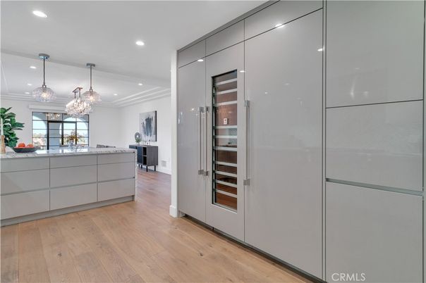 Chandelier, Interior, Kitchen, Pendant Lights, Recessed Lighting, Stainless Steel Appliances, Wood Texture Flooring