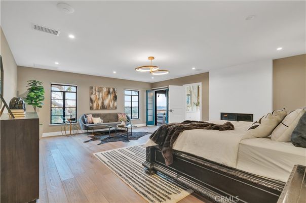 Bedroom, Fireplace, Interior, Pendant Lights, Recessed Lighting, Wood Texture Flooring