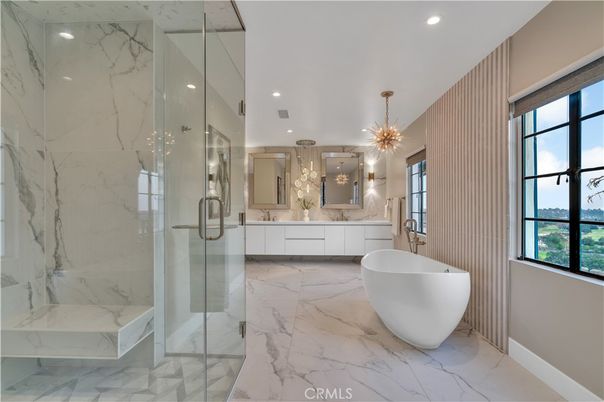 Bathroom, Dual Sink Vanities, Free Standing Baths, Glass Shower, Interior, Marble, Marble Walls, Pendant Lights, Recessed Lighting