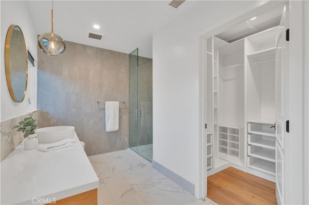 Bathroom, Glass Shower, Interior, Marble, Pendant Lights, Recessed Lighting, Wood Texture Flooring
