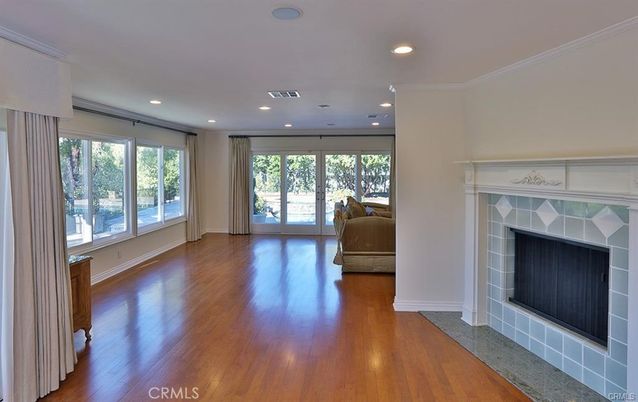 Bedroom, Fireplace, Interior, Recessed Lighting, Wood Texture Flooring