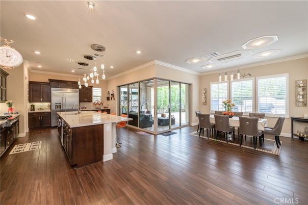 Dining room, Interior, Kitchen, Pendant Lights, Recessed Lighting, Stainless Steel Appliances, Wood Texture Flooring