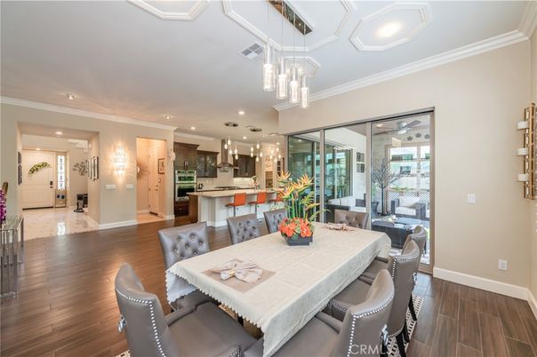 Dining room, Interior, Kitchen, Pendant Lights, Recessed Lighting, Stainless Steel Appliances, Wood Texture Flooring