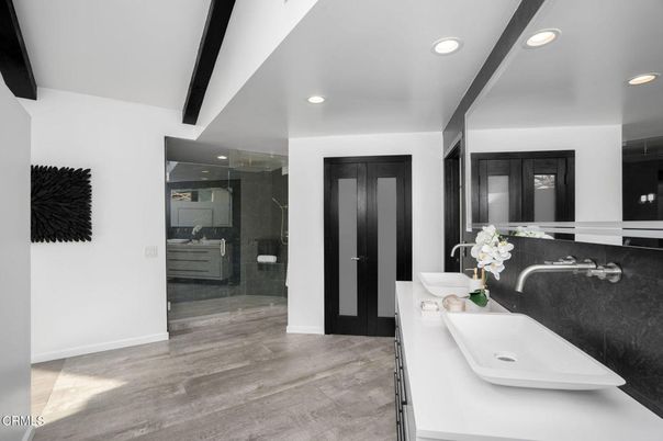 Bathroom, Dual Sink Vanities, Glass Shower, Interior, Recessed Lighting, Wood Texture Flooring