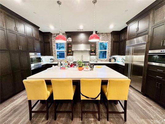 Interior, Kitchen, Pendant Lights, Recessed Lighting, Stainless Steel Appliances, Stone Walls, Wood Texture Flooring