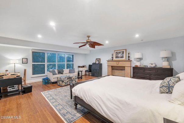 Bedroom, Fireplace, Interior, Recessed Lighting, Wood Texture Flooring