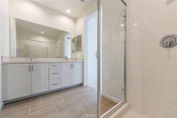 Bathroom, Dual Sink Vanities, Glass Shower, Interior, Recessed Lighting