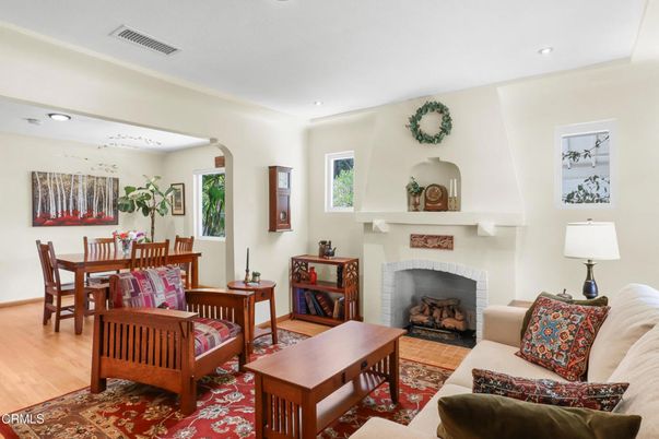 Dining room, Fireplace, Interior, Living room, Recessed Lighting, Wood Texture Flooring