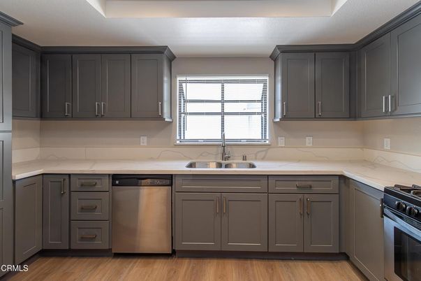 Interior, Kitchen, Marble Walls, Stainless Steel Appliances, Wood Texture Flooring