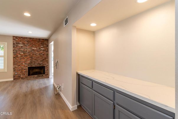 Fireplace, Interior, Recessed Lighting, Stone Walls, Wood Texture Flooring