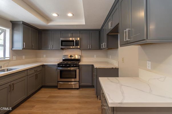 Interior, Kitchen, Recessed Lighting, Stainless Steel Appliances, Wood Texture Flooring