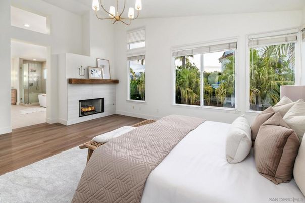 Bedroom, Chandelier, Fireplace, Interior, Recessed Lighting, Wood Texture Flooring