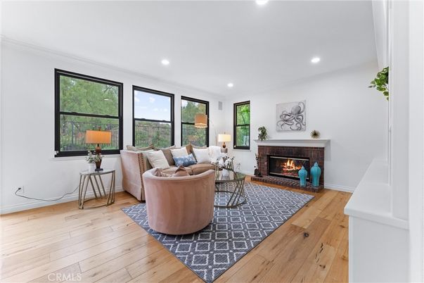 Fireplace, Interior, Living room, Recessed Lighting, Wood Texture Flooring