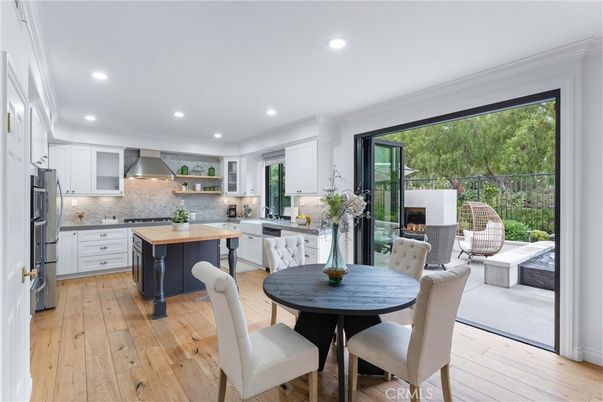 Dining room, Interior, Kitchen, Recessed Lighting, Stainless Steel Appliances, Wood Texture Flooring