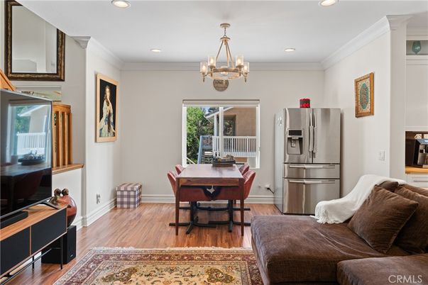 Chandelier, Dining room, Interior, Kitchen, Recessed Lighting, Stainless Steel Appliances, Wood Texture Flooring