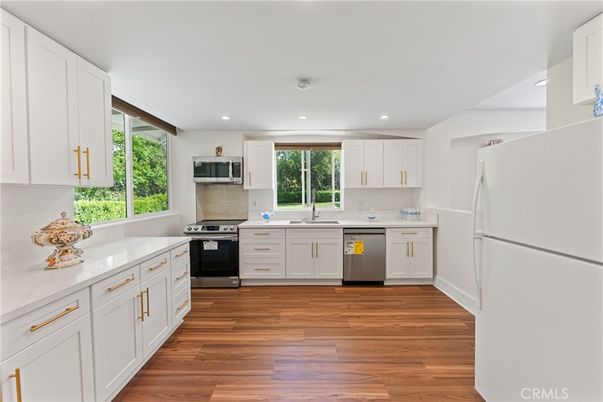 Interior, Kitchen, Recessed Lighting, Stainless Steel Appliances, Wood Texture Flooring