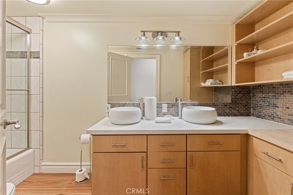 Bathroom, Dual Sink Vanities, Glass Shower, Interior, Wood Texture Flooring