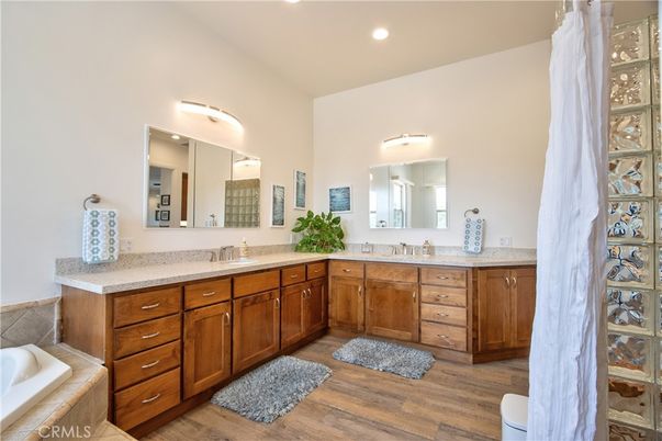 Bathroom, Dual Sink Vanities, Interior, Recessed Lighting, Wood Texture Flooring