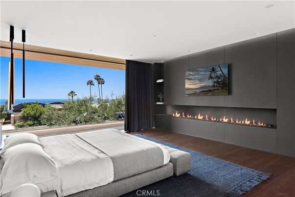 Bedroom, Fireplace, Interior, Recessed Lighting, Water, Wood Texture Flooring