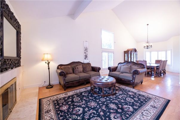 Chandelier, Dining room, Fireplace, Interior, Living room, Wood Texture Flooring
