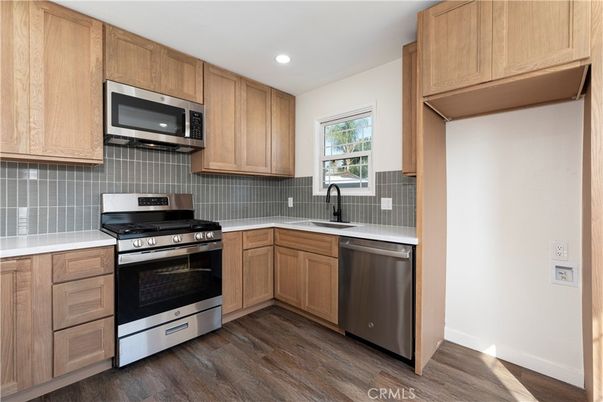 Interior, Kitchen, Recessed Lighting, Stainless Steel Appliances, Wood Texture Flooring