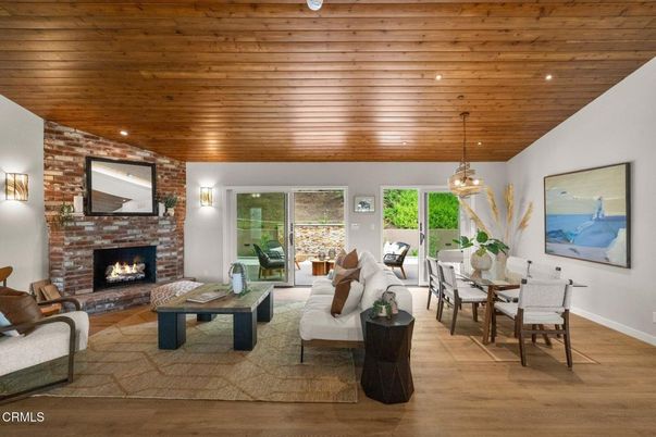 Dining room, Fireplace, Interior, Living room, Pendant Lights, Recessed Lighting, Stone Walls, Wooden Ceilings, Wood Texture Flooring