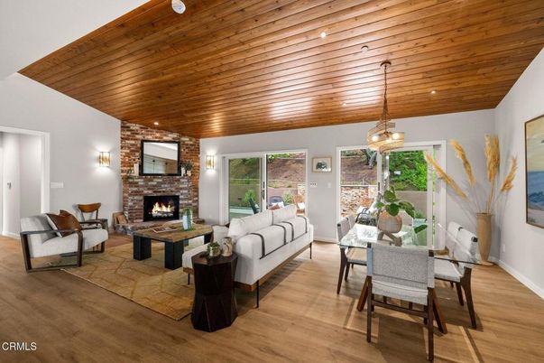 Dining room, Fireplace, Interior, Living room, Pendant Lights, Recessed Lighting, Stone Walls, Wooden Ceilings, Wood Texture Flooring