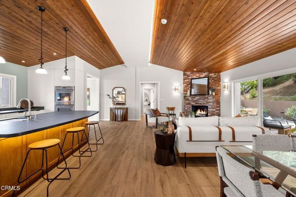 Fireplace, Interior, Living room, Pendant Lights, Recessed Lighting, Stone Walls, Wooden Ceilings, Wood Texture Flooring