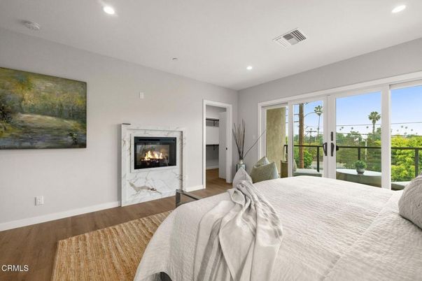 Bedroom, Fireplace, Interior, Recessed Lighting, Wood Texture Flooring