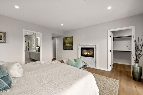 Bedroom, Fireplace, Interior, Recessed Lighting, Wood Texture Flooring