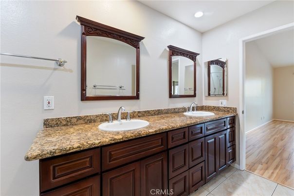 Bathroom, Dual Sink Vanities, Interior, Recessed Lighting, Wood Texture Flooring