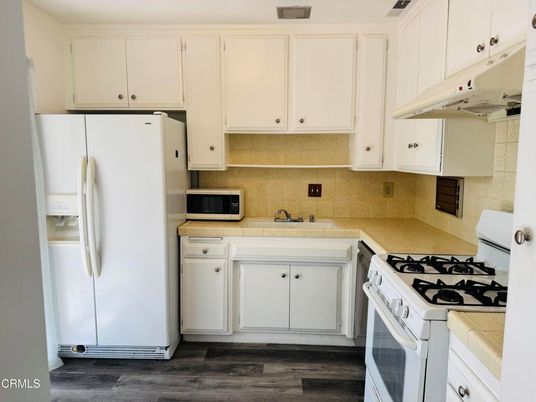 Interior, Kitchen, Tile Countertops, Wood Texture Flooring