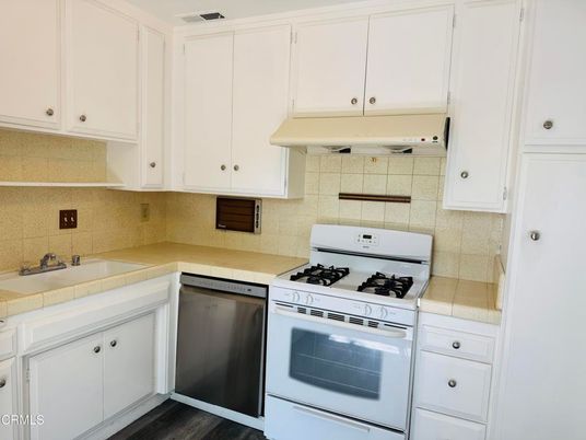 Interior, Kitchen, Tile Countertops, Wood Texture Flooring