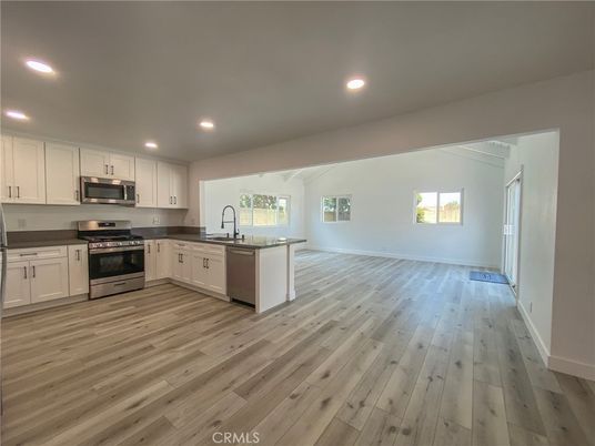 Interior, Kitchen, Recessed Lighting, Stainless Steel Appliances, Wood Texture Flooring