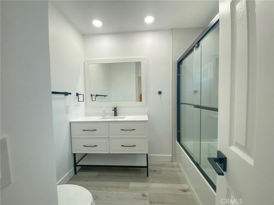 Bathroom, Glass Shower, Interior, Recessed Lighting, Wood Texture Flooring