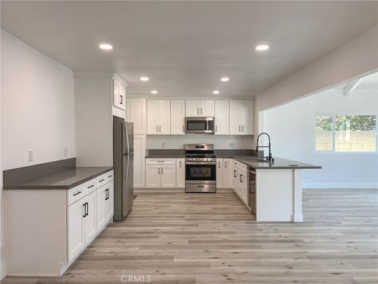 Interior, Kitchen, Recessed Lighting, Stainless Steel Appliances, Wood Texture Flooring