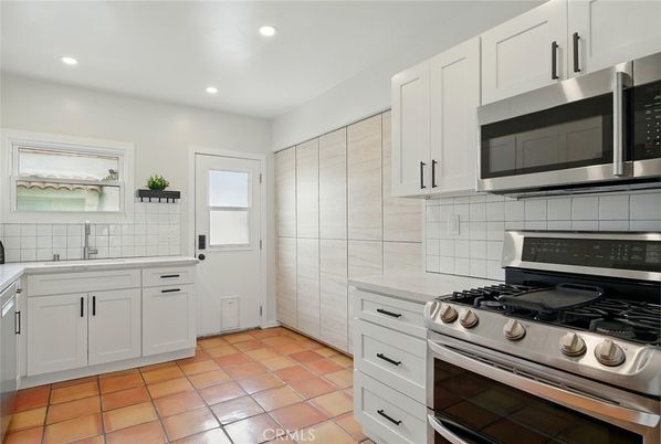 Interior, Kitchen, Recessed Lighting, Stainless Steel Appliances, Tile Countertops