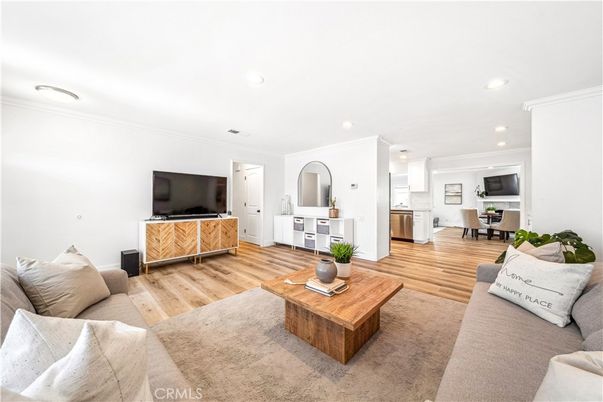 Dining room, Interior, Kitchen, Living room, Recessed Lighting, Stainless Steel Appliances, Wood Texture Flooring