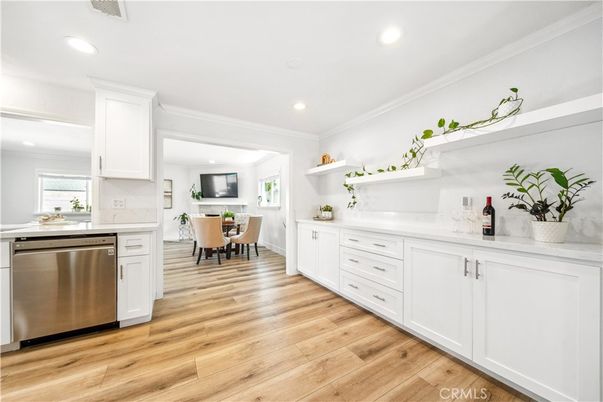 Dining room, Interior, Kitchen, Recessed Lighting, Stainless Steel Appliances, Wood Texture Flooring