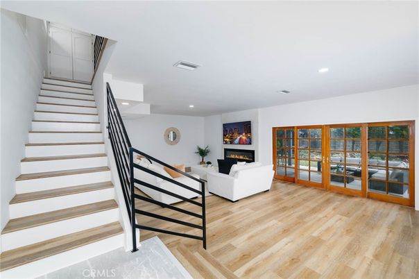 Fireplace, Interior, Living room, Recessed Lighting, Wood Texture Flooring